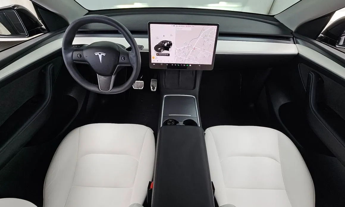 Tesla Model Y — фото 9