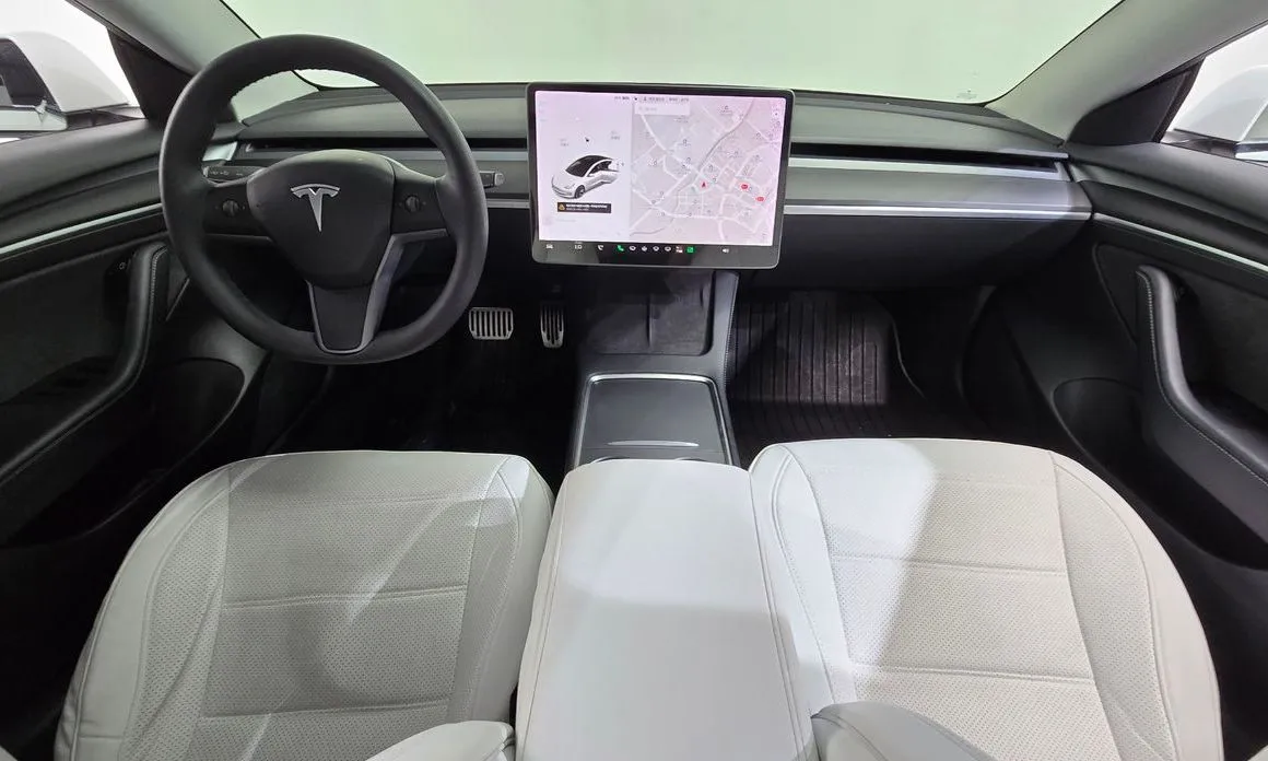 Tesla Model 3 — фото 9