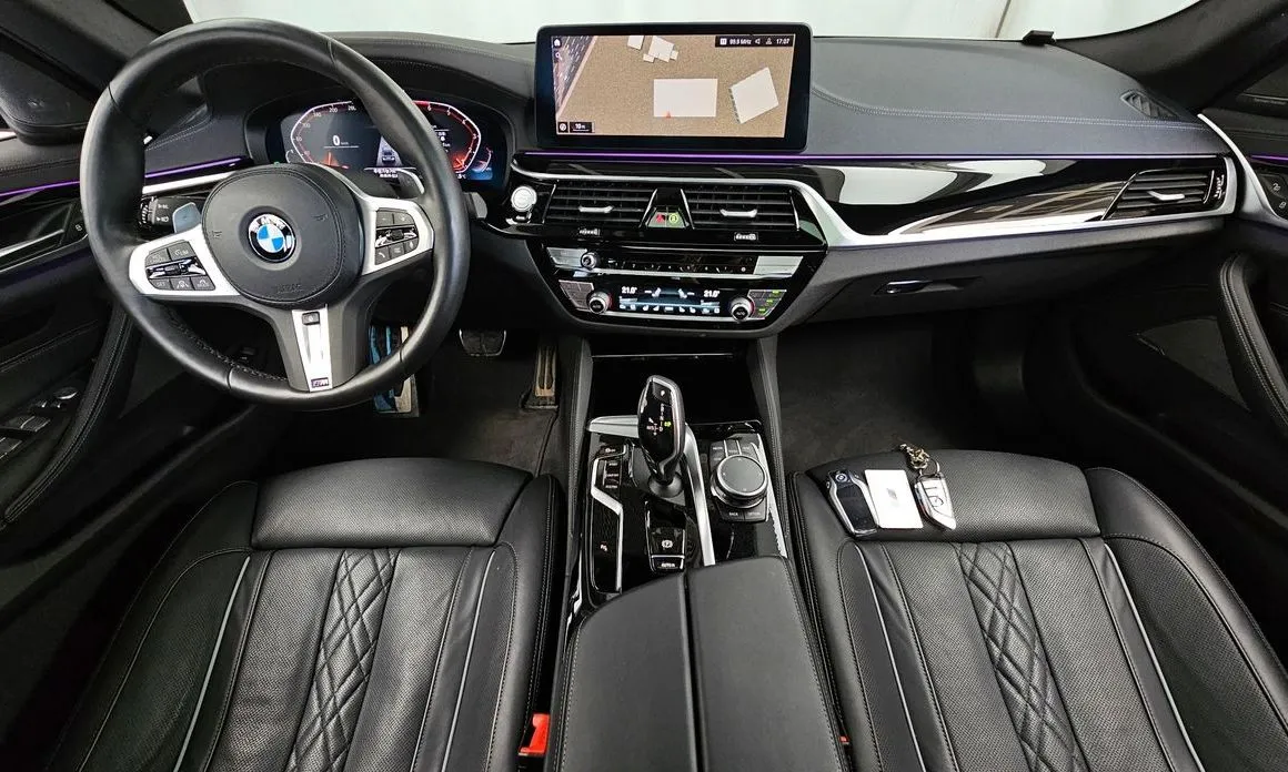 BMW 5-Series — фото 10