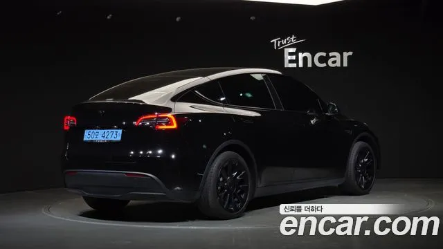 Tesla Model Y — фото 6