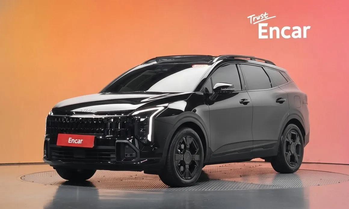 Kia Sportage — фото 1