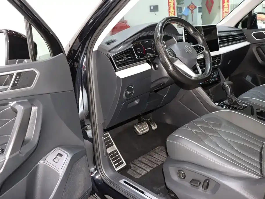 Volkswagen Tiguan L — фото 3