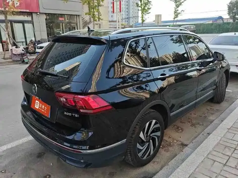 Volkswagen Tiguan L — фото 8