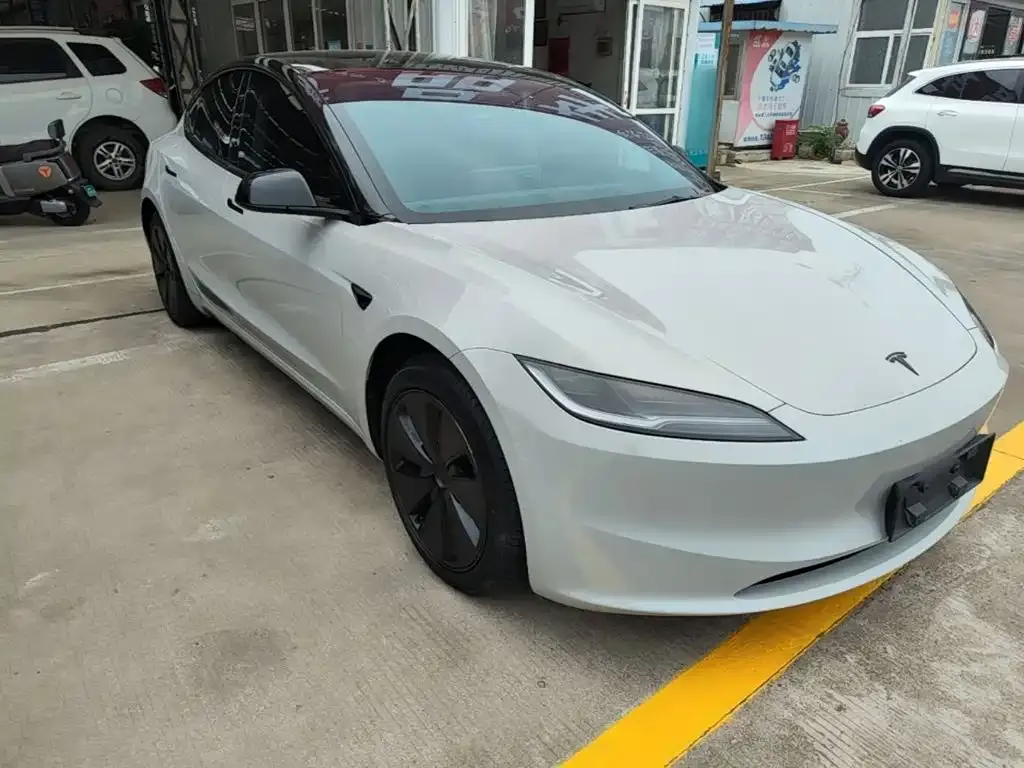 Tesla Model 3 — фото 7