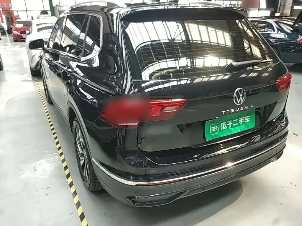Volkswagen Tiguan L — фото 3