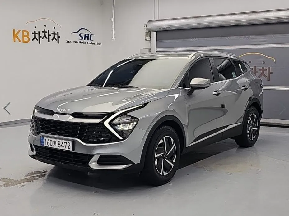 Kia Sportage — фото 1