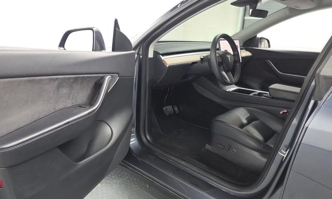 Tesla Model Y — фото 7