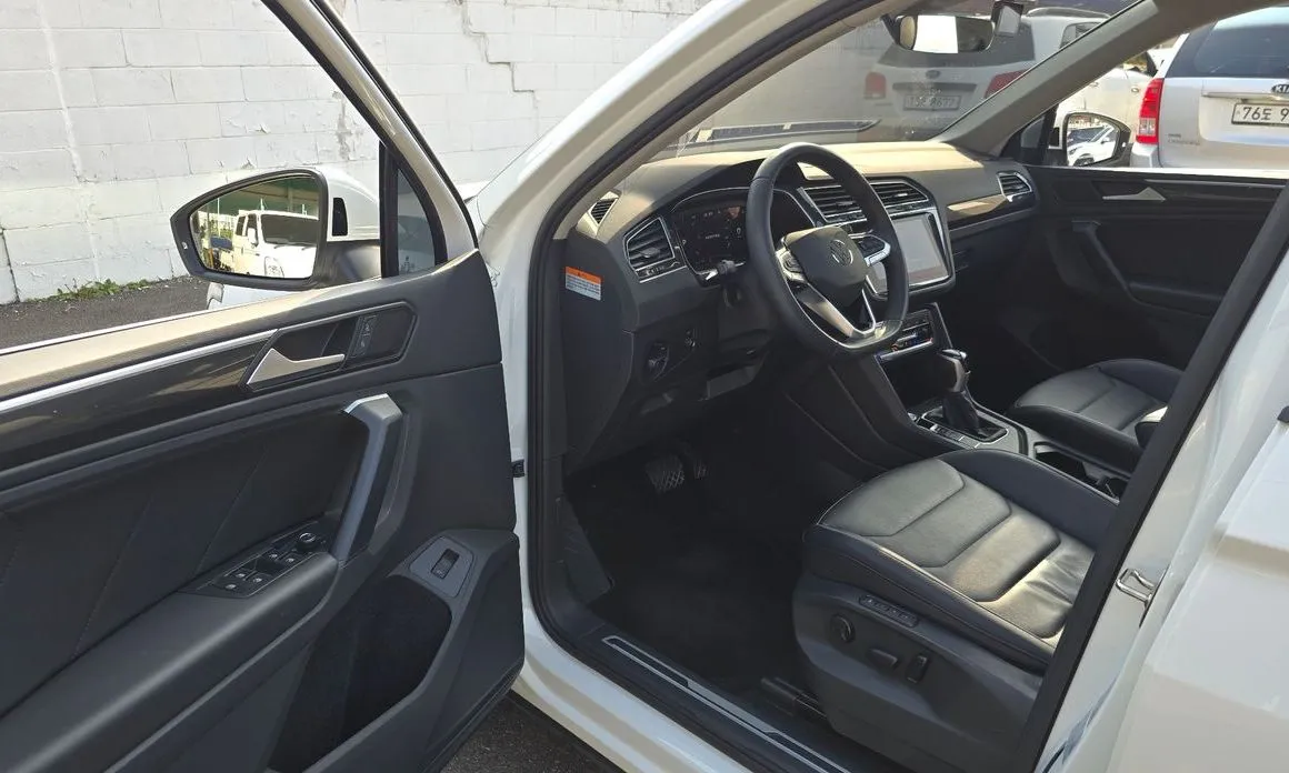 Volkswagen Tiguan — фото 7