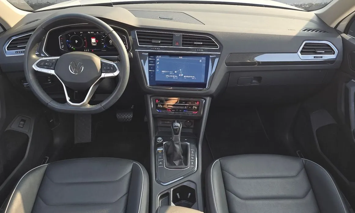 Volkswagen Tiguan — фото 10