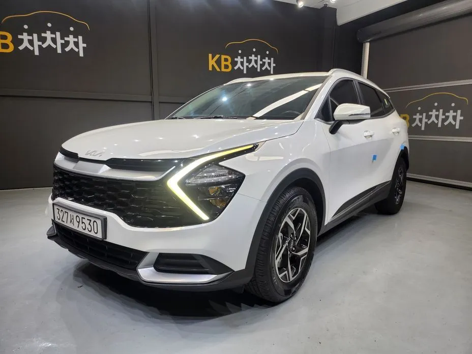 Kia Sportage — фото 1