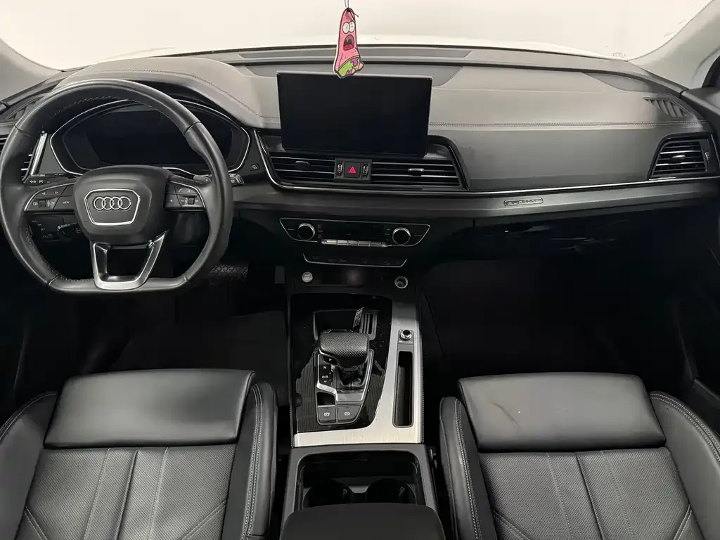 Audi Q5L — фото 10