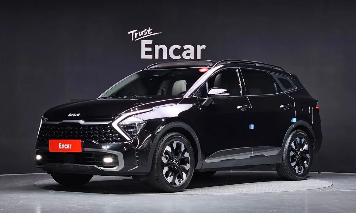 Kia Sportage — фото 1
