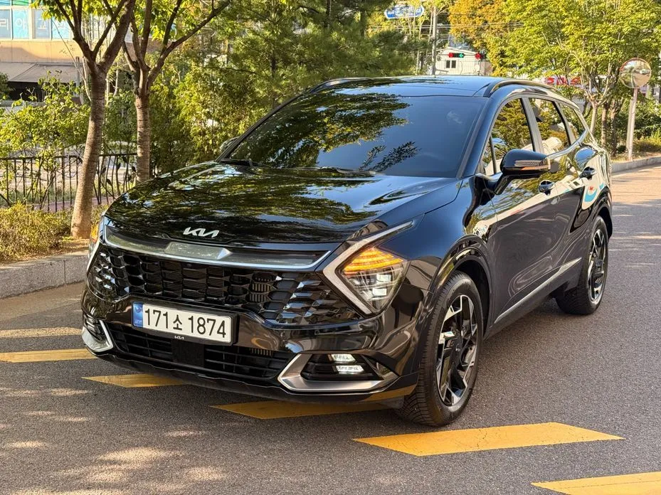 Kia Sportage — фото 1