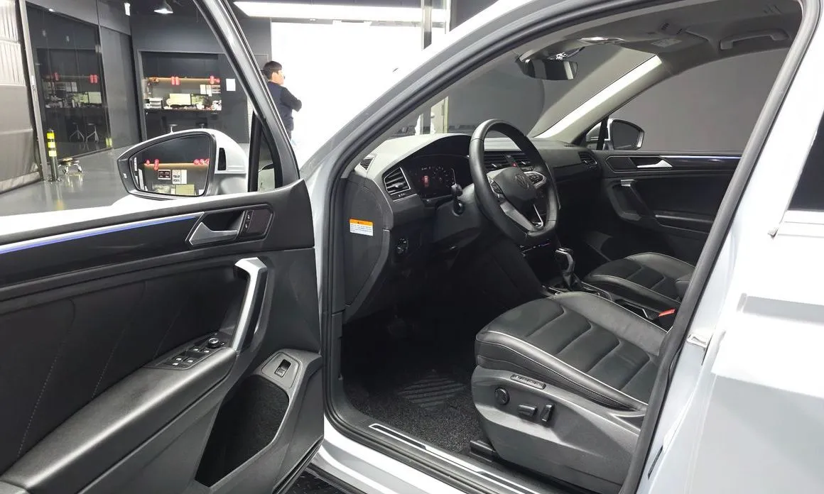 Volkswagen Tiguan — фото 8
