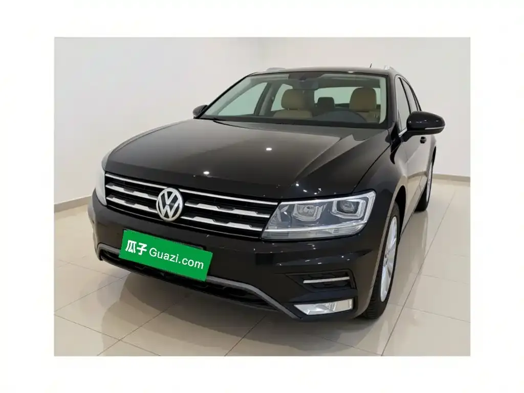 Volkswagen Tiguan L — фото 1