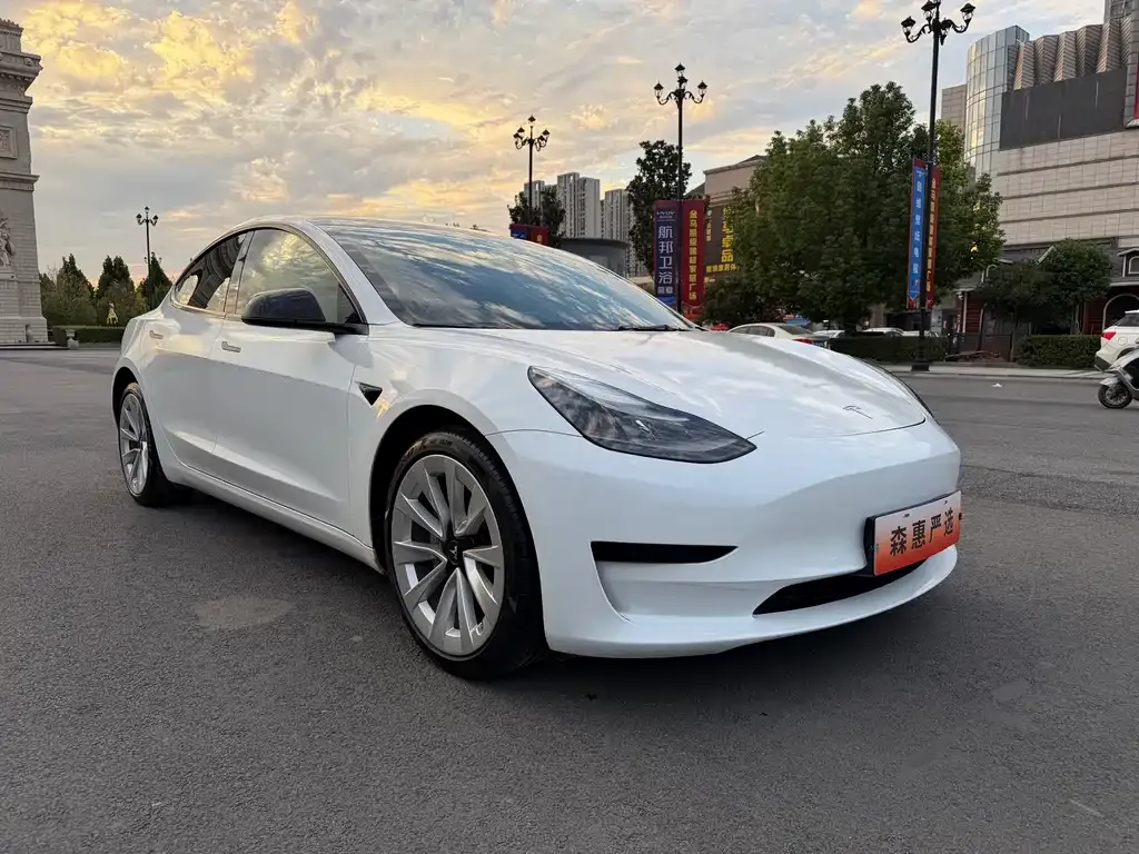 Tesla Model 3 — фото 7