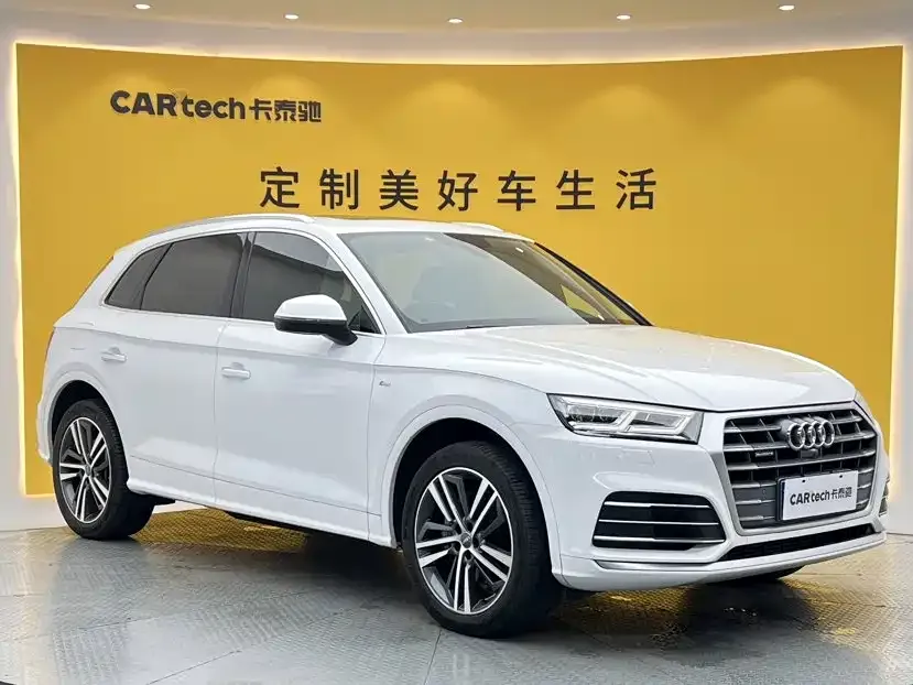 Audi Q5L — фото 10