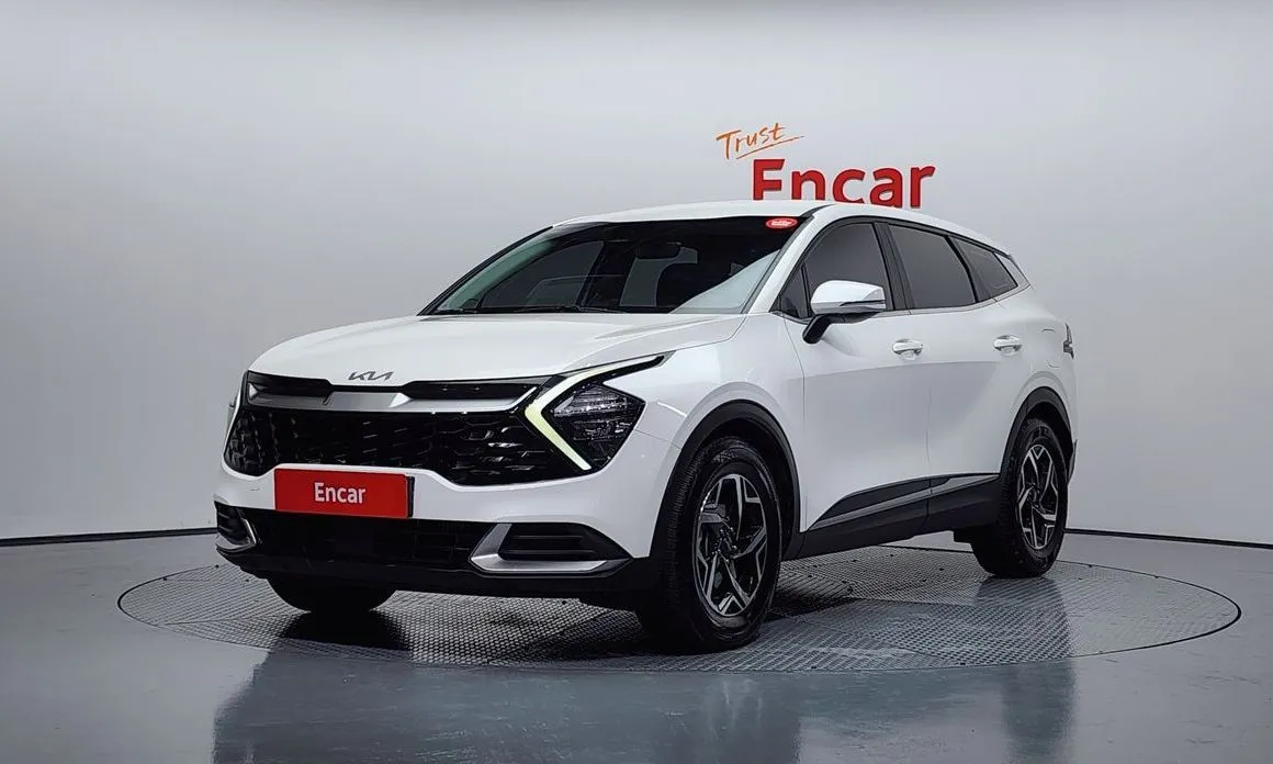 Kia Sportage — фото 1