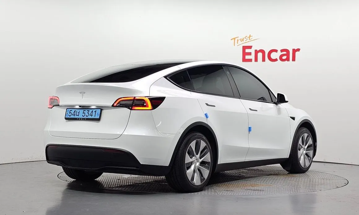 Tesla Model Y — фото 6
