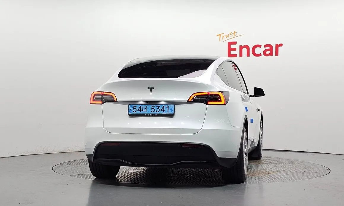 Tesla Model Y — фото 7
