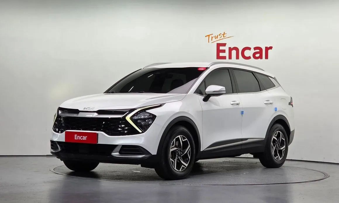 Kia Sportage — фото 1