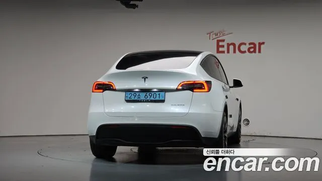 Tesla Model Y — фото 7