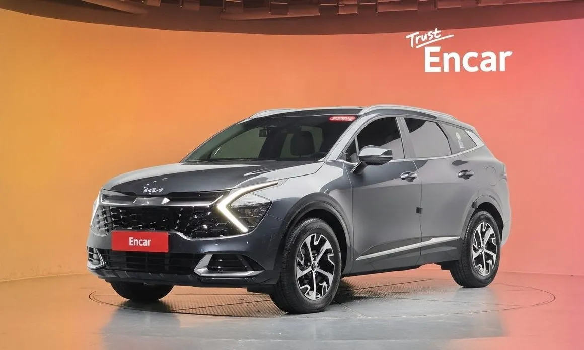 Kia Sportage — фото 1