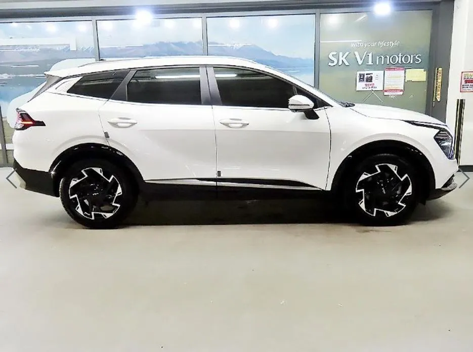 Kia Sportage — фото 5