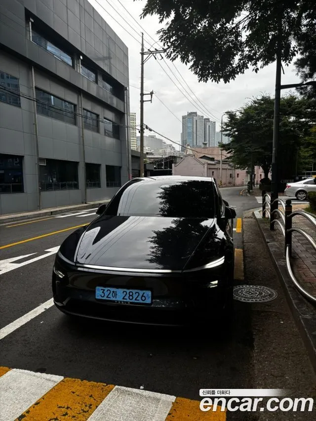 Tesla Model Y — фото 1