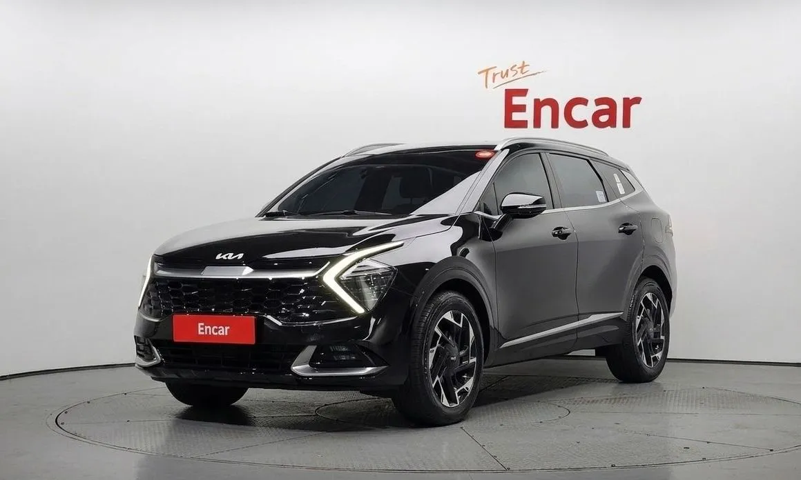 Kia Sportage — фото 1