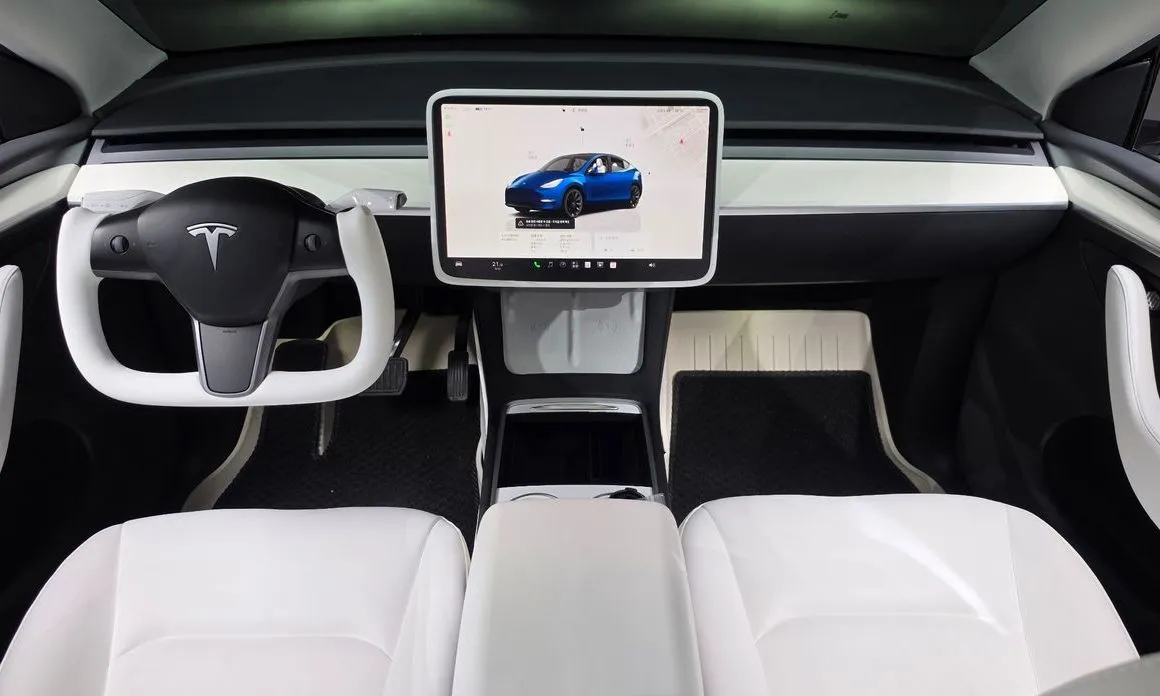 Tesla Model Y — фото 7