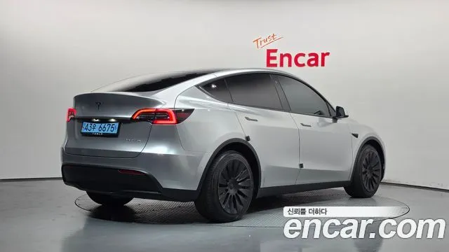 Tesla Model Y — фото 6