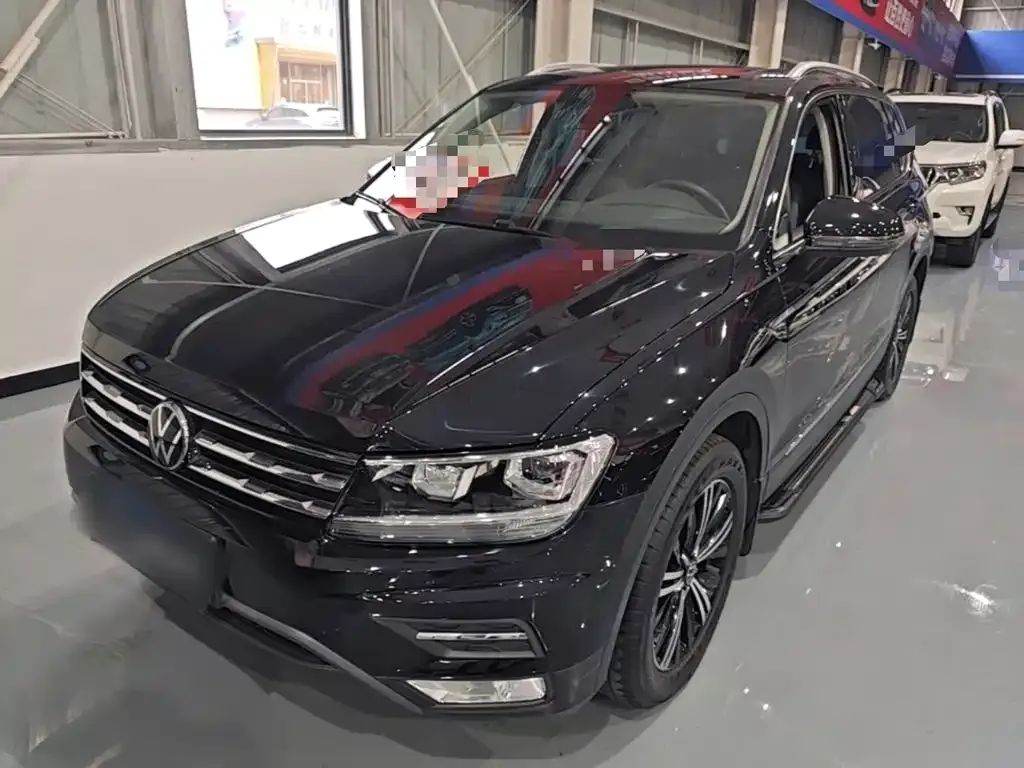 Volkswagen Tiguan L — фото 10