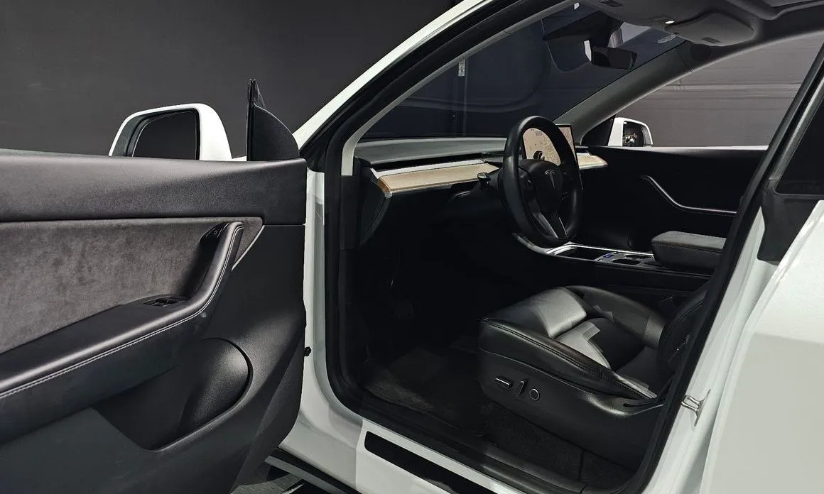 Tesla Model Y — фото 9
