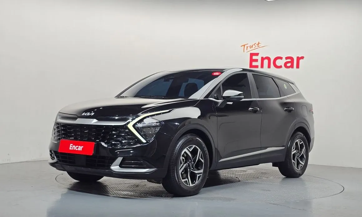 Kia Sportage — фото 1