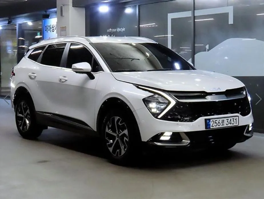 Kia Sportage — фото 1