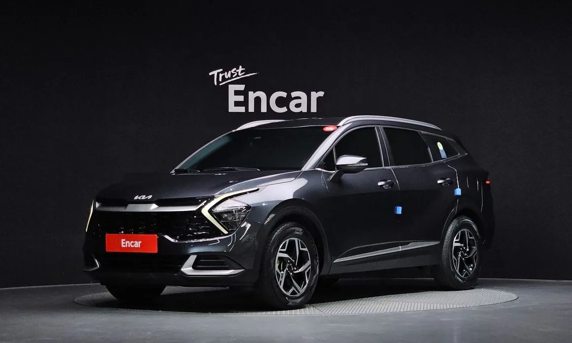 Kia Sportage — фото 1
