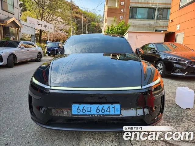 Tesla Model Y — фото 1