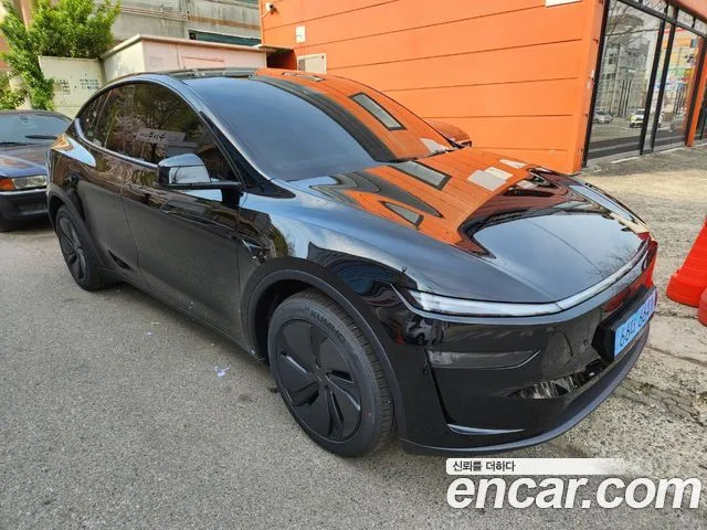 Tesla Model Y — фото 9
