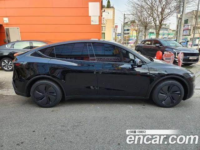 Tesla Model Y — фото 5