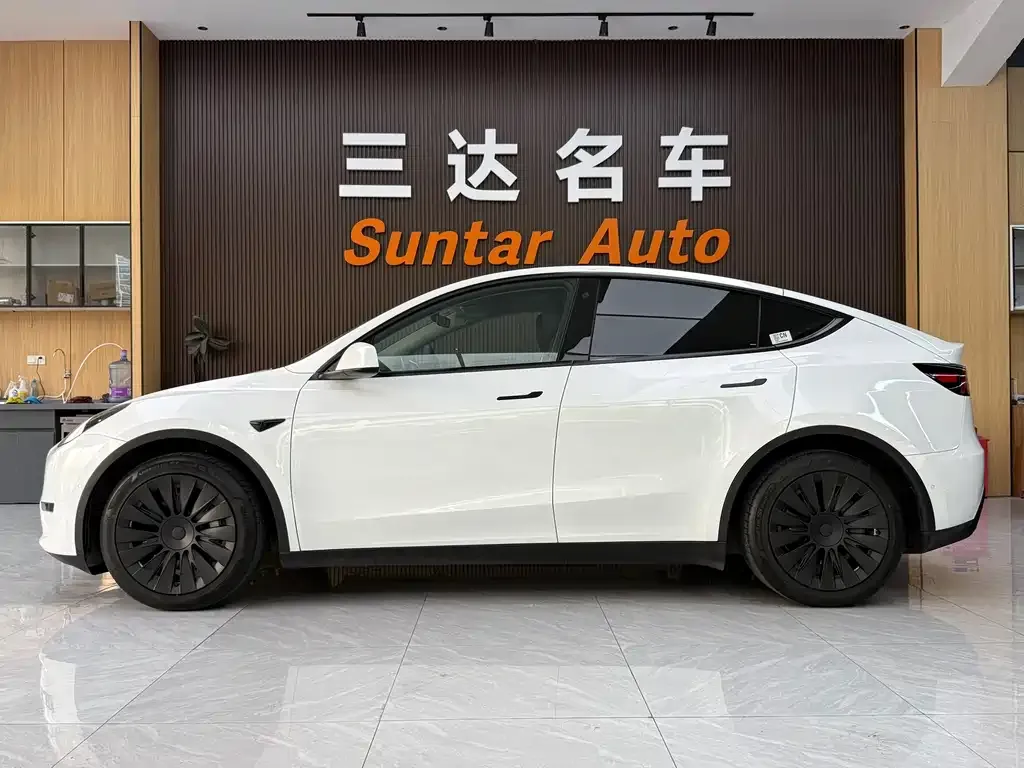 Tesla Model Y — фото 5