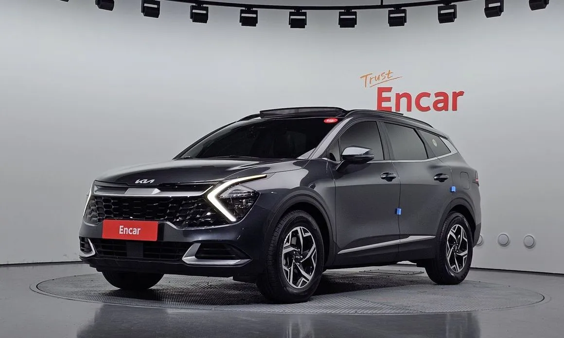 Kia Sportage — фото 1