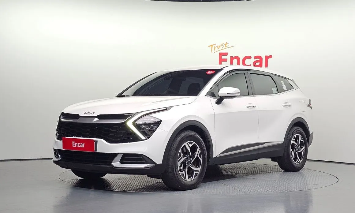 Kia Sportage — фото 1