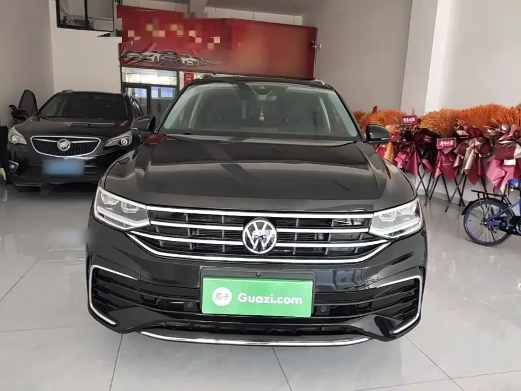 Volkswagen Tiguan L — фото 4