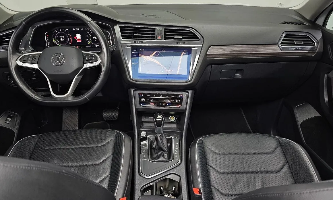 Volkswagen Tiguan — фото 10