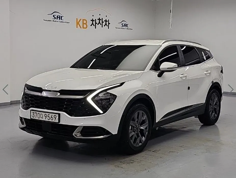 Kia Sportage — фото 1
