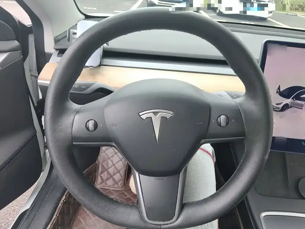 Tesla Model 3 — фото 9