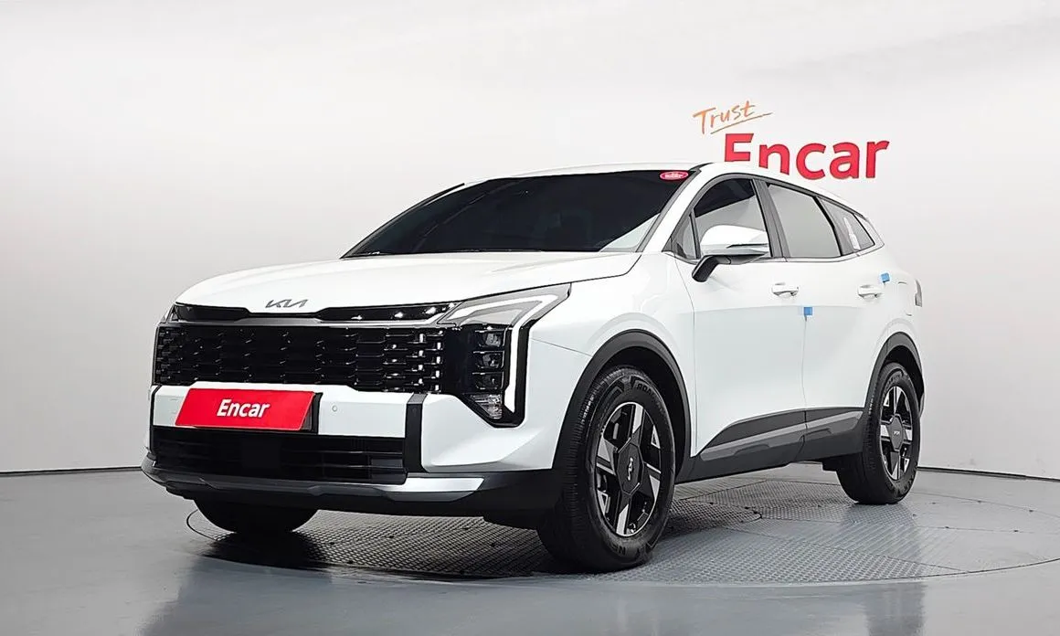 Kia Sportage — фото 1
