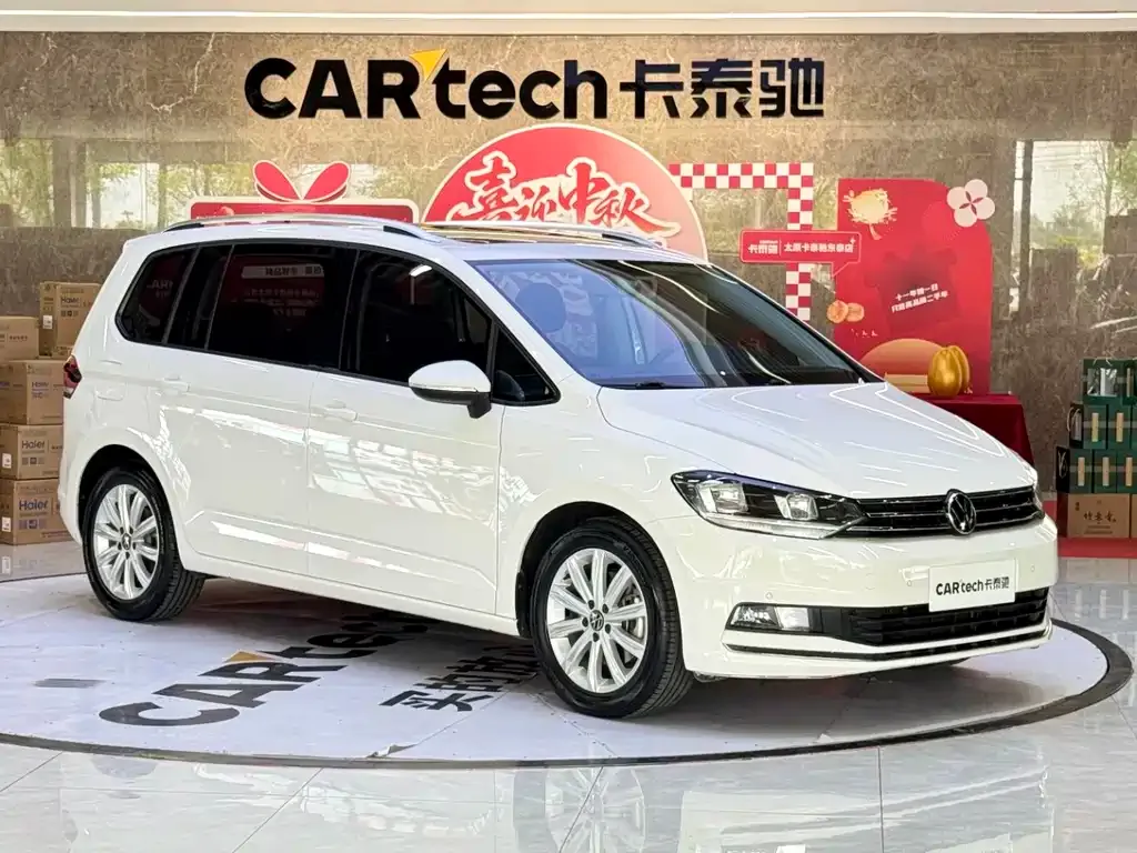 Volkswagen Touran — фото 10