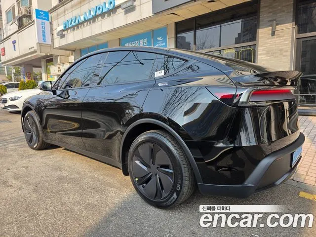 Tesla Model Y — фото 6